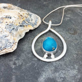 Turquoise silver statement pendant